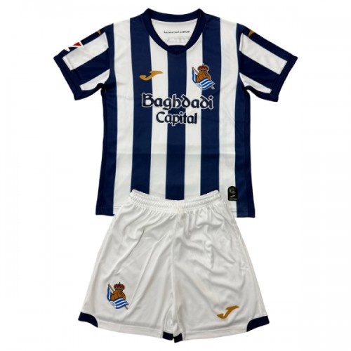 Conjunto/Equipación Real Sociedad Niño Primera 2026-27 Conjunto/Equipación Real Sociedad Niño Primera 2026-27